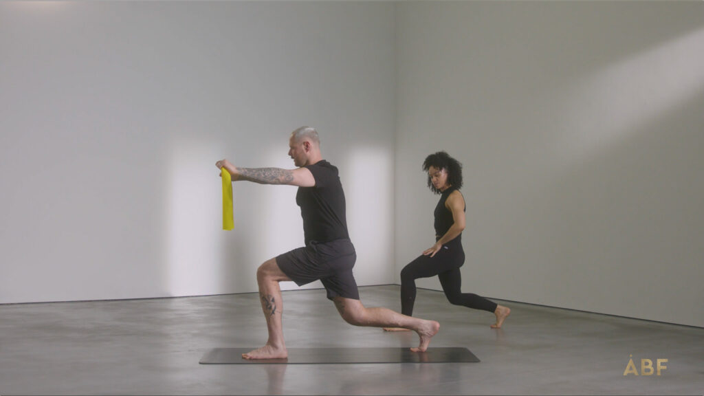 Man exercising with resistance band