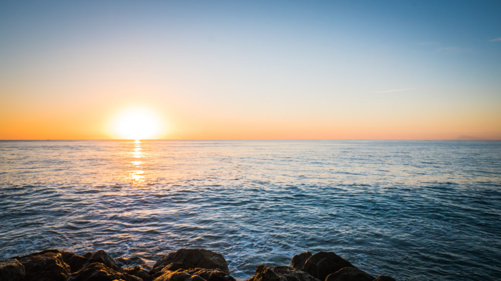 A,Photo,Of,The,Sun,Rising,Over,The,Mediterranean,Sea.