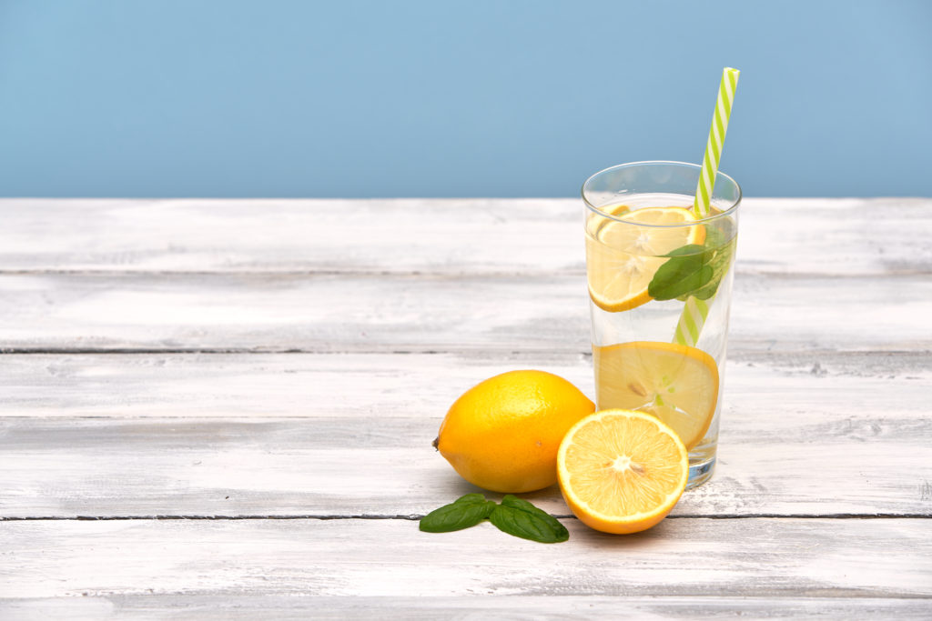 Water,With,Lemon,In,A,Glass,Container