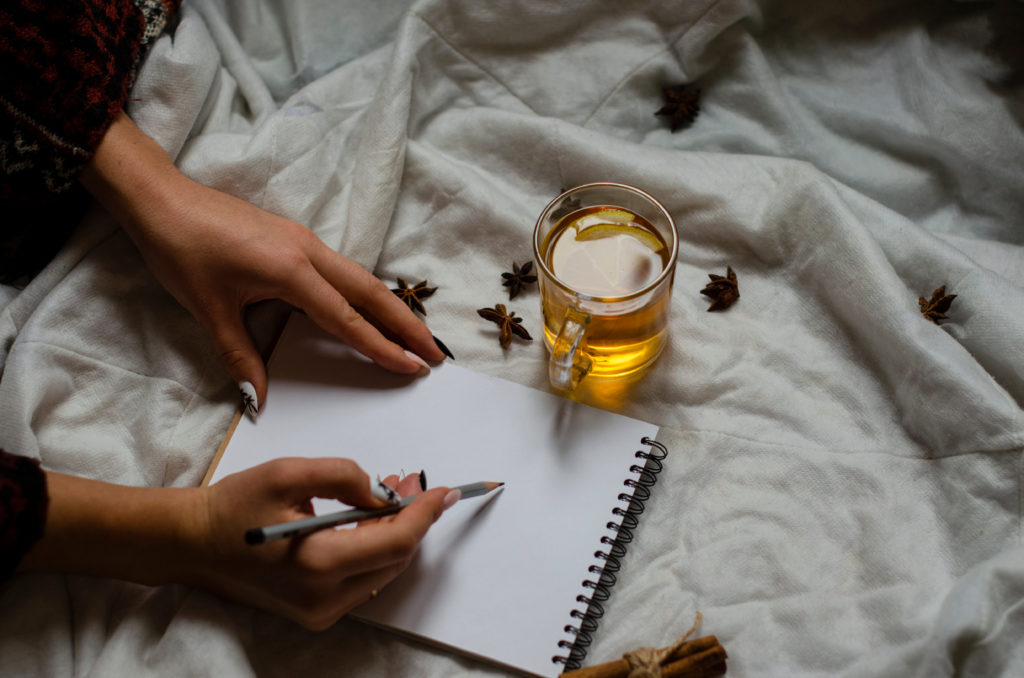 Notebook,For,Drawing,With,A,Pencil,And,A,Cup,Of