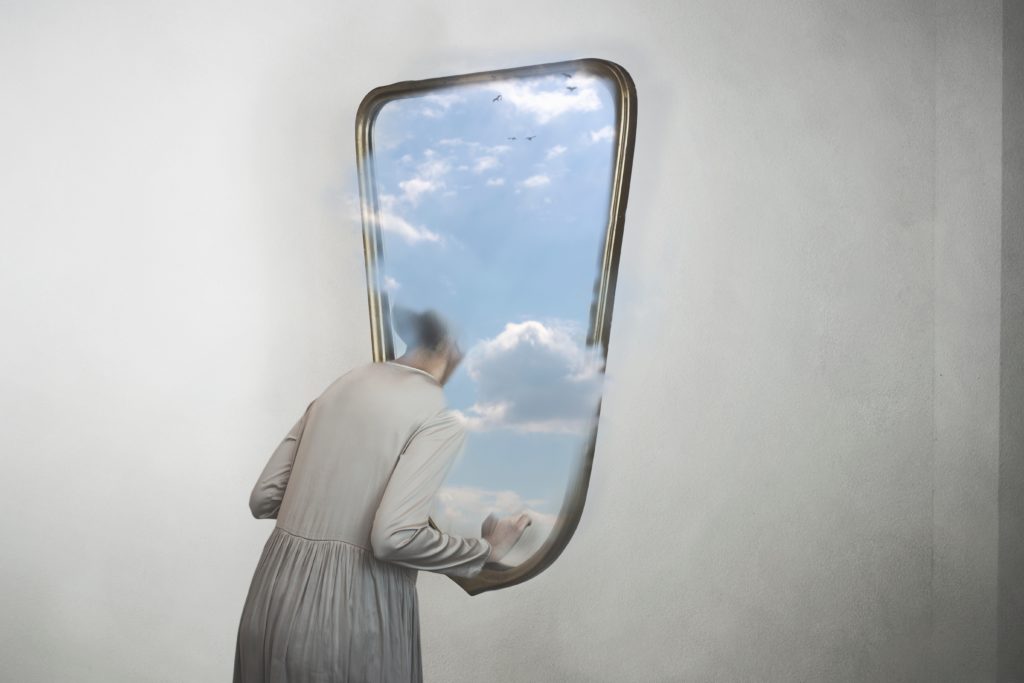 Woman,In,Search,Of,Freedom,Escapes,From,A,Mirror,That